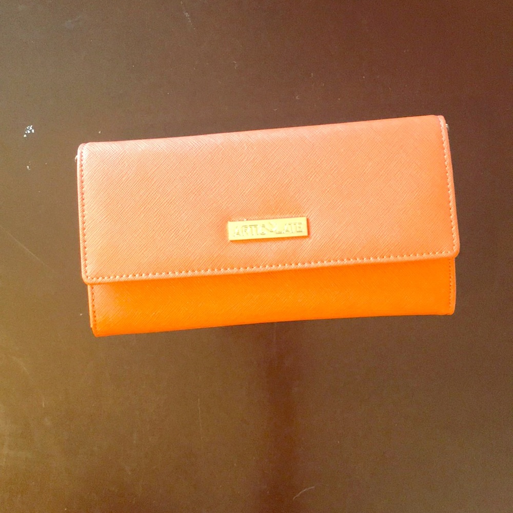 Orange chain press/clutch